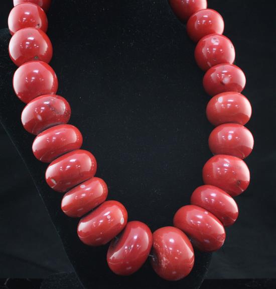 A single strand stained large coral bead necklace, 18in.